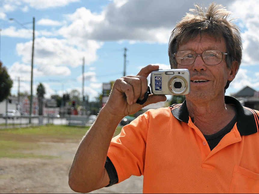 WHAT A FIND: Ranald McAvley who saved a Downs tiger snake (similar to the one inset) from a drink can has captured a video of his rescue. Screenshots of the rescue mission pictured below. WHAT A FIND: Ranald McAvley who saved a Downs tiger snake (similar to the one inset) from a drink can has captured a video of his rescue. Screenshots of the rescue mission pictured below.